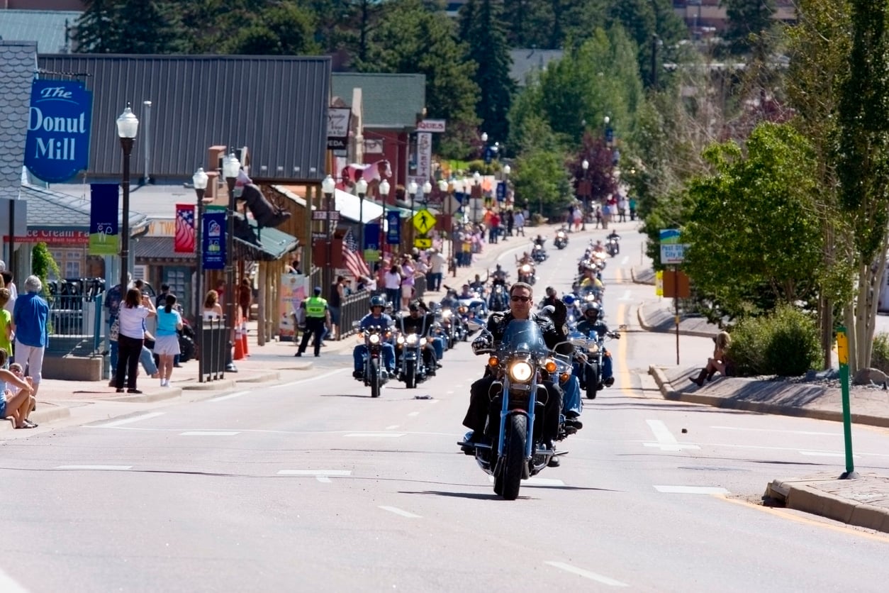 Woodand Park, Colorado, USA - August 16, 2014: Riders in a motorcycle rally to honor U.S. veterans runs from Woodland Park, Colorado to Cripple Creek, Colorado on Highway 24